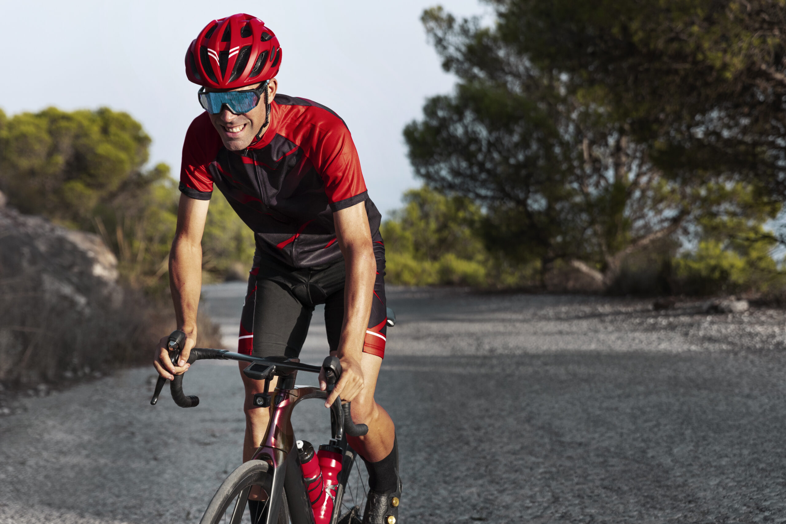 male-cyclist-training-with-bicycle-outdoors